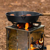 A Mini Outdoor Fire Stove Made of Stainless Steel, Suitable for Picnics, Barbecues, And Camping, Comes with a Storage Bag.